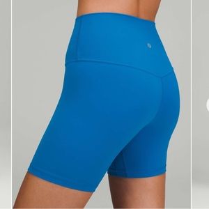 Lululemon turquoise bike shorts, size 4, worn twice, excellent condition